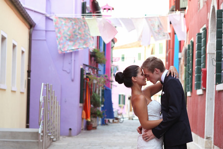 Bride and groom embracing in Venice, Italyの写真素材