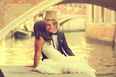 Bride and groom embracing in Venice, Italyの写真素材
