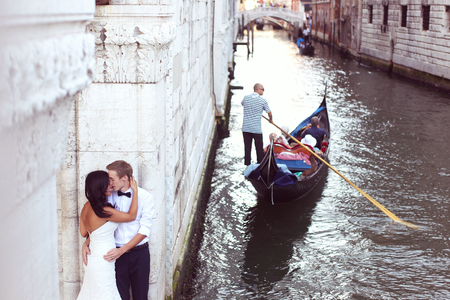 Bride and groom embracing in Venice, Italyの写真素材