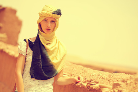 Beautiful women wearing turban in desertの写真素材