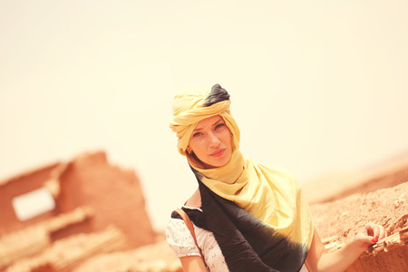 Beautiful women wearing turban in desertの写真素材