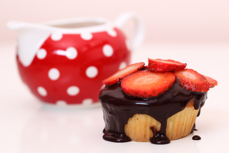 Delicious  cupcake with strawberries and chocolateの写真素材