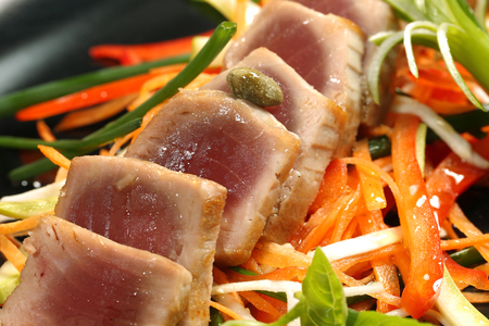 Delicious gourmet food with tuna and vegetablesの写真素材