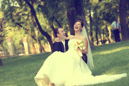 Beautiful bride and groom celebrating their wedding dayの写真素材