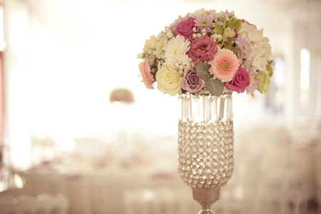 Beautiful bouquet in elegant vase with colorful flowersの写真素材