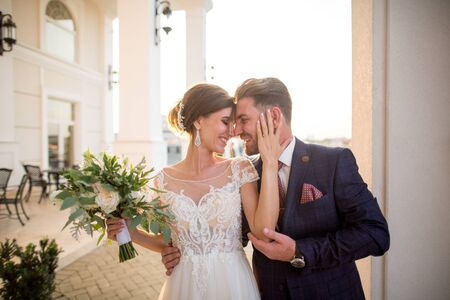 Beautiful wedding couple posing outdoor in sunのeditorial素材