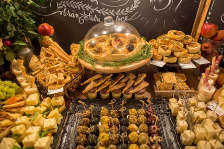 Delicious cheese bar with fruits in a beautiful decorationの写真素材