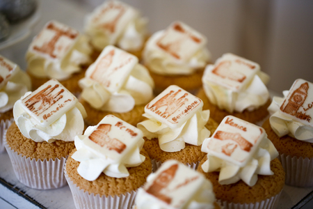 Delicious cupcakes on tableの写真素材