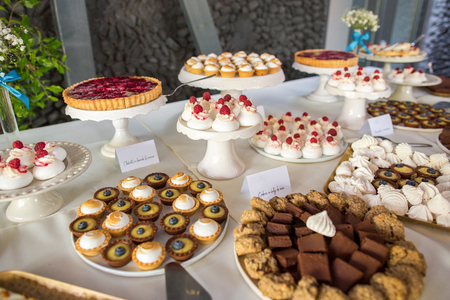 Delicious wedding reception candy bar dessert tableの写真素材