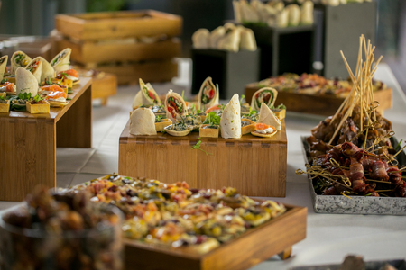 Table with delicious finger foodの写真素材