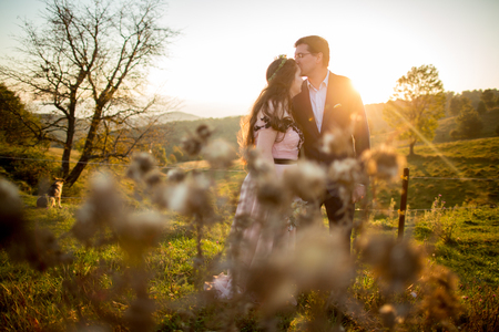 Beautiful wedding couple posing in nature;の写真素材