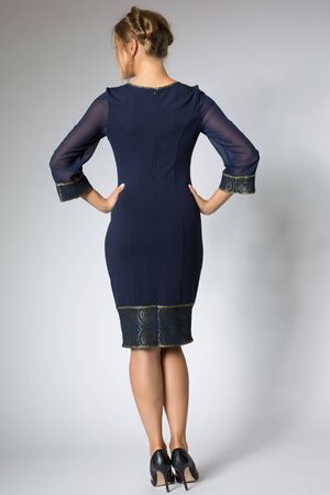 Beautiful girl posing in blue dressの写真素材