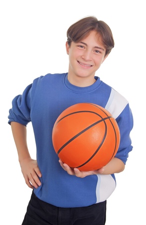 Smileing Teenage boy holding a basketballの写真素材