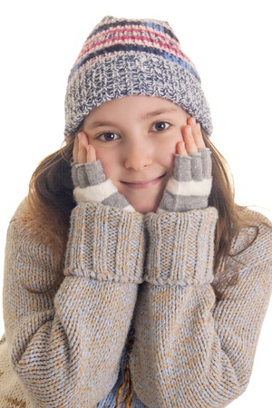 Cute girl with hands on her cheeks isolated on whiteの写真素材