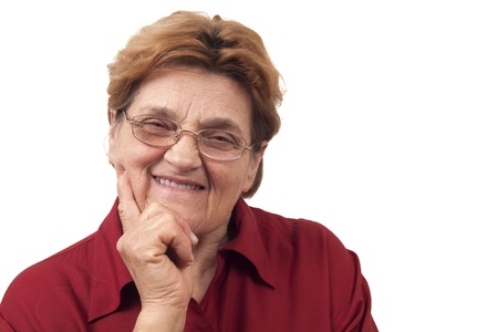 Senior smiling women with glasses isolated on whiteの写真素材