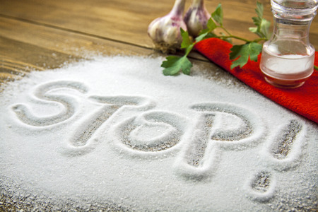 STOP written on a heap of salt - antihypertensive campaignの写真素材