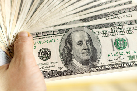 American dollars in hand. Macroの写真素材