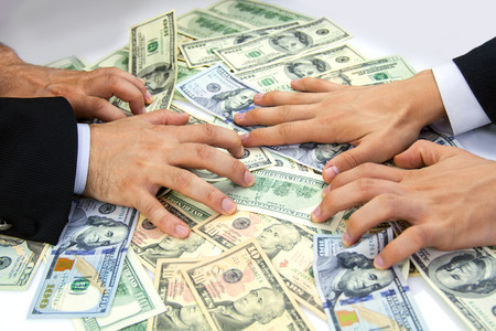 American dollars in hands. Money concept. Grabbing money