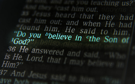 Do you believe in the Son of God?Bible text from John 9:35, the Bible. Visual effects to emphasize the messageの写真素材