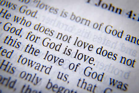 GOD IS LOVEBible text from 1 John 4:8, the Bible. Visual effects to emphasize the message. Macroの写真素材
