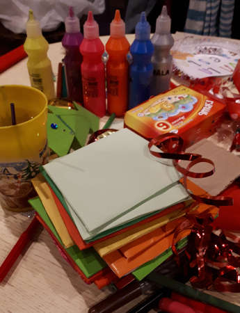 Novorossiysk. Russia. February 14, 2019 Set for children's creativity on the table. Paints, pencils, preparations for the holiday. Colored paper, brushes. Handmaid.のeditorial素材