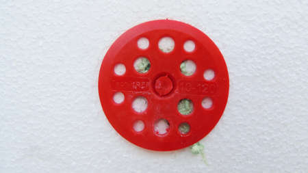 Construction and repair of houses. Nail for attaching foam panels to the exterior wall of a...