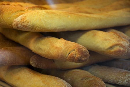 Wood oven cooked bread, the focus is in the foregroundの写真素材