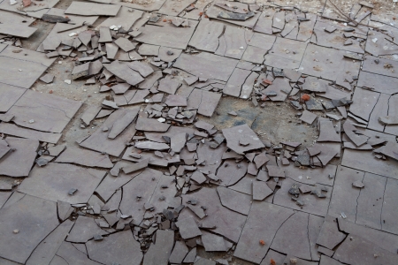 Old and broken asbestos floor tilesの写真素材
