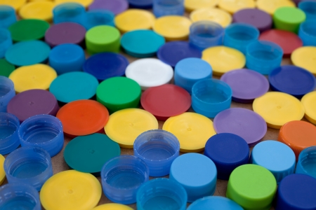 Background made with recycled plastic bottle capsの写真素材