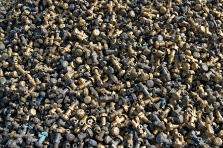 TOULOUSE, FRANCE - CIRCA 2009  Gas bottles brass knobs lie in a heap at an undisclosed recycling facility circa 2009 in Toulouse  The brass will be transported to a foundry to be melted のeditorial素材
