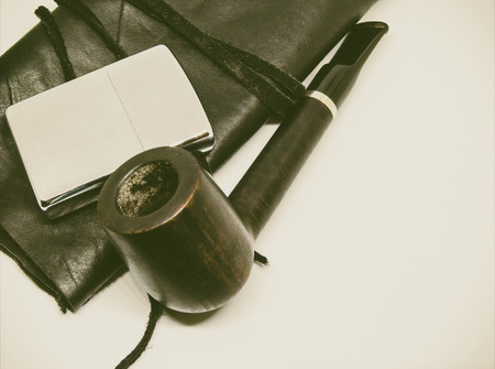 smoking pipe and leather bagの写真素材