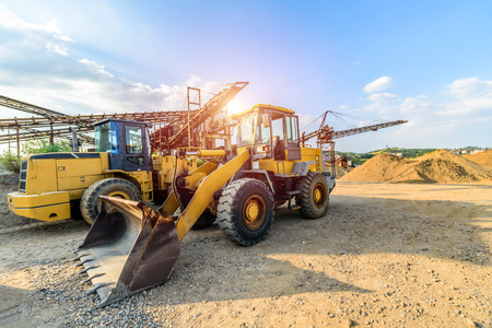 excavator at sandpit during earthmoving works