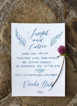 Wedding details flat lay on stone background. Wedding invitation. Ring box. Copyspace. Mock up.の写真素材