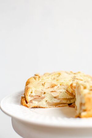 Homemade Organic Apple Pie Dessert Charlotte. Cobbler Apple Pie on White Plate and white backgroundの写真素材