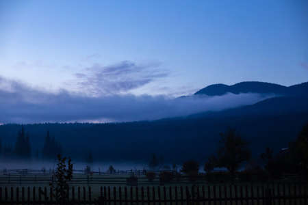 Landscape nature view background. View from street at a wonderful landscape nature view with space for your text in mountainsの写真素材