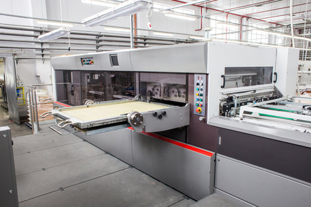 The equipment for a press. Offset machine at the printing manufacturing. Printing machine.の写真素材
