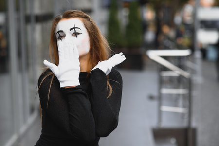 Mime on the street waiting to meet with his loverの写真素材