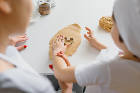 Happy mother and little son in the kitchen, happy time and togetherness