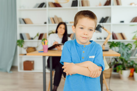 The concept of child psychology. A boy at the psychologistの写真素材