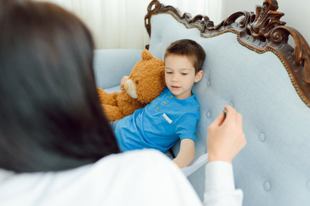 Child psychologist attending small boy. The concept of psychological assistance to children.の写真素材