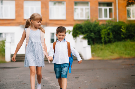 Two little friends go to school. schoolchildren. back to school