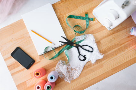 The various tools and accessories for needlework, top view.