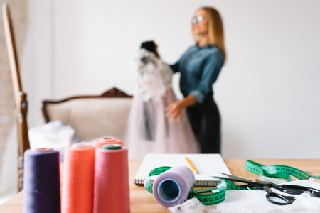 Fashion designer working in the studio.の写真素材