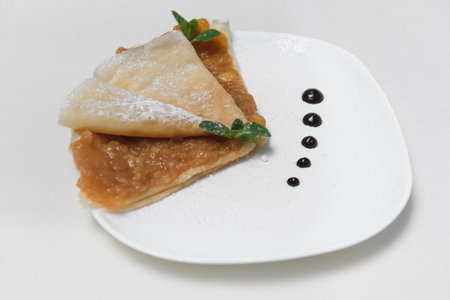 Two Pancakes with apple on white backgroundの写真素材