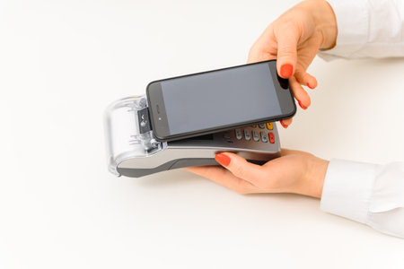 paying through smartphone using NFC technology. payment by phone through the terminal