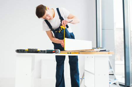 Hilarious busy constructor repairing apartment