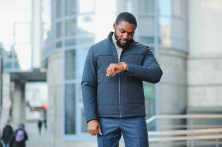 African American man in stylish new clothes on the streetの写真素材