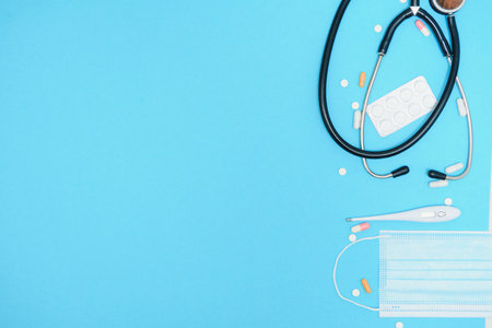 Top view of medicines, work tools and accessories doctor, nurse. Medical set - Tablets, thermometer,...