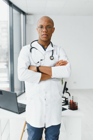 young male African doctor in hospitalの写真素材