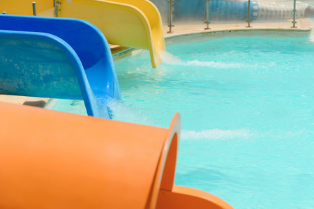 Colorful aquapark constructions in swimming-poolの写真素材